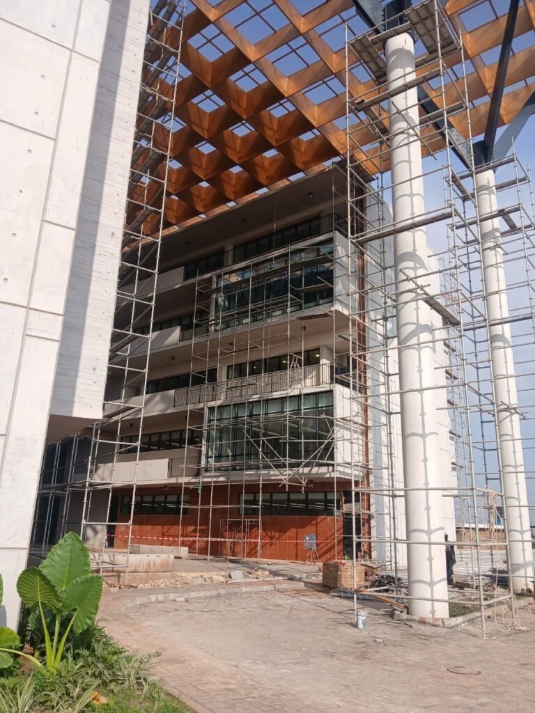 Commercial building with scaffolding ready for post-construction cleaning