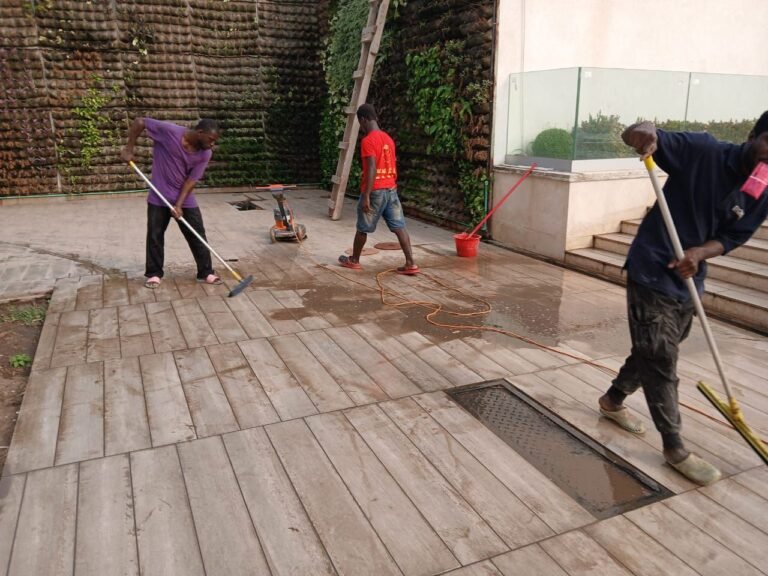 Dromo cleaner mopping a polished marble corridor