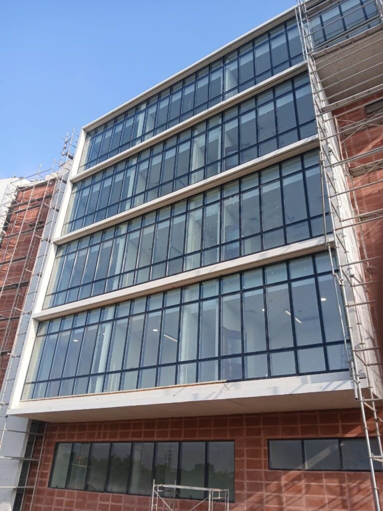 Glass-fronted office building with clean windows in Accra