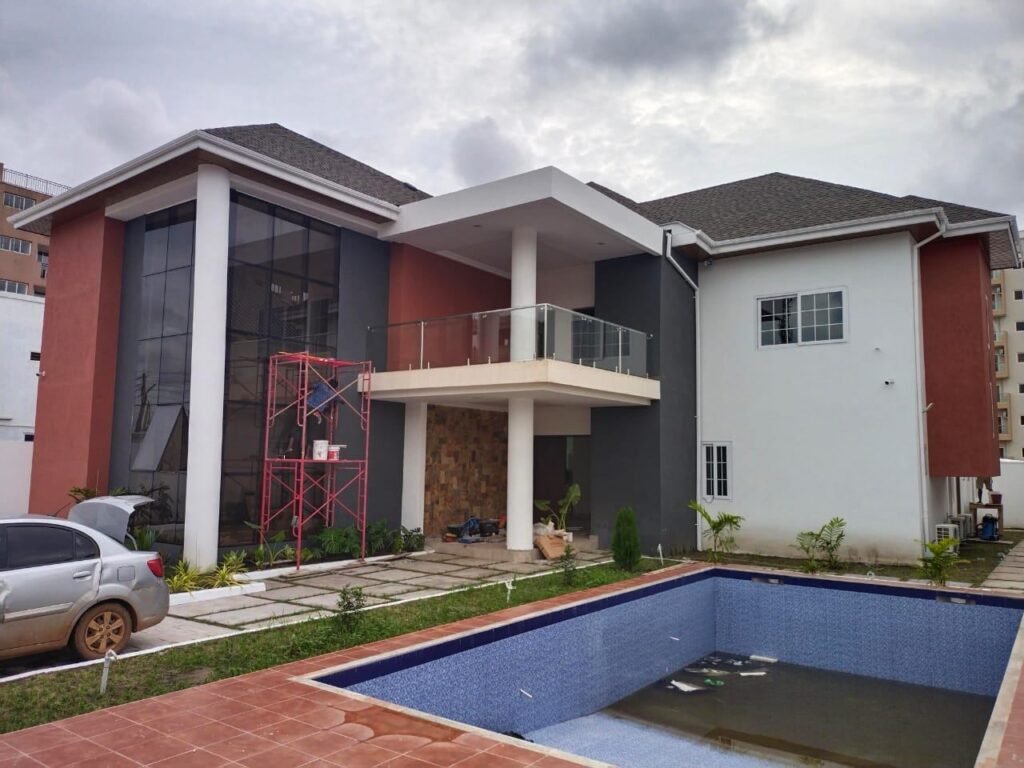 Modern house with pool and clean exterior after cleaning in Accra