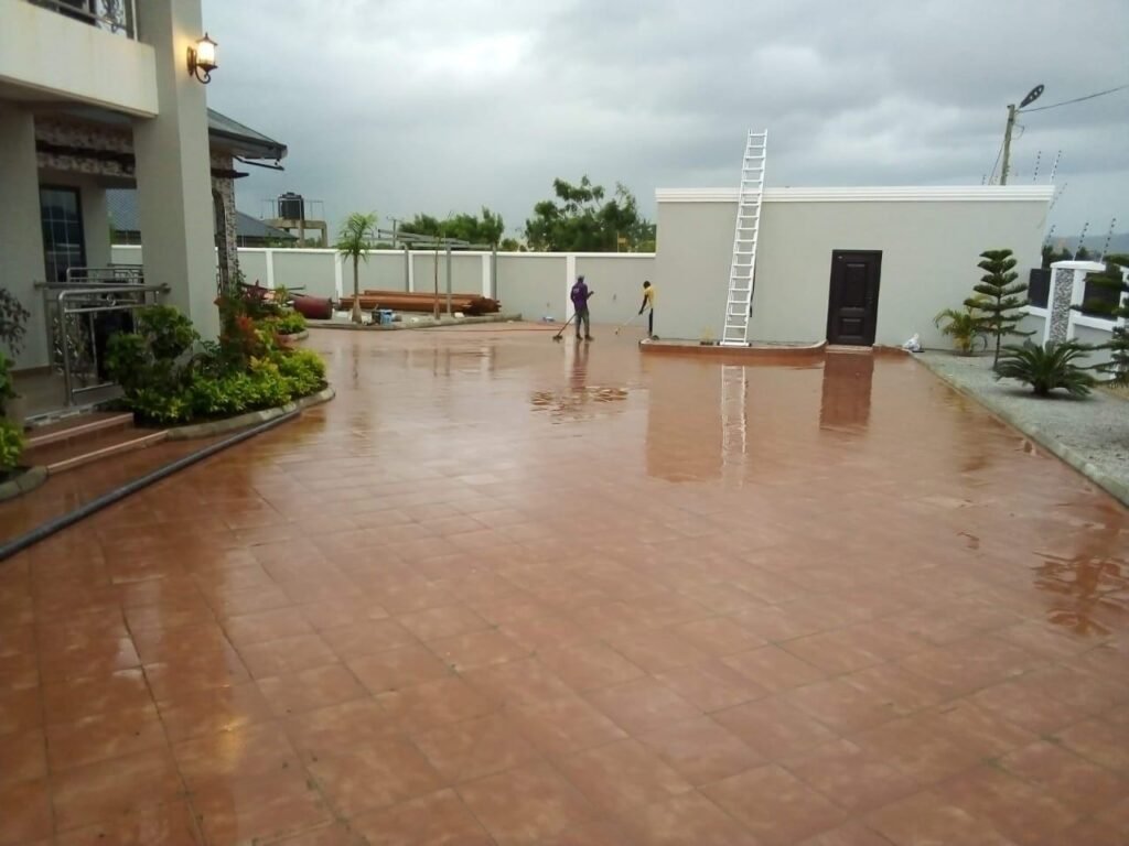 Freshly washed compound tiles outside a home in Accra